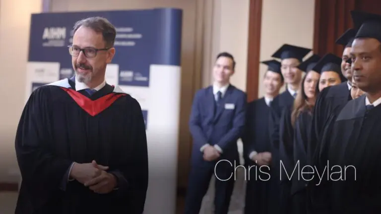 Chris Meylan speaking with AIHM hospitality management students during a graduation ceremony at AIHM Bangkok
