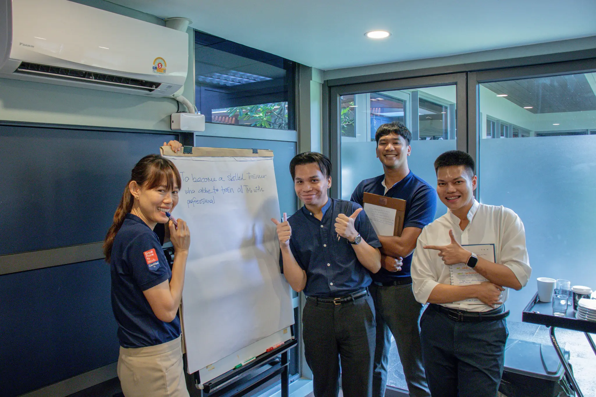 Hospitality professionals attending AIHM executive education programme in Bangkok, collaborating in service excellence training and team-based workshop activity