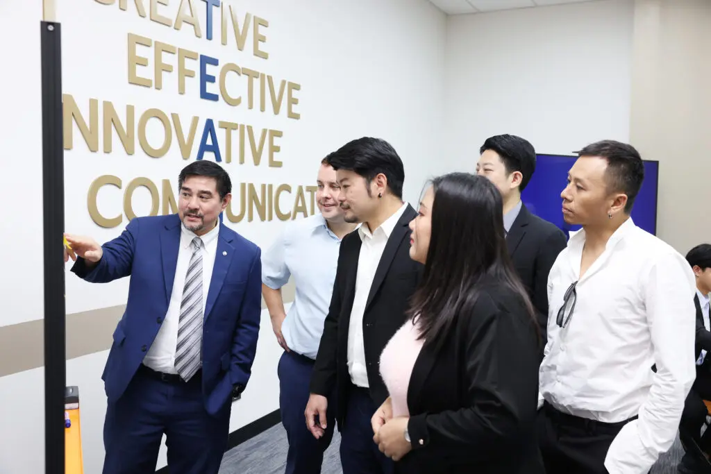 Hospitality professionals engaging in an AIHM executive education session, guided through real workplace scenarios designed to solve day-to-day operational challenges and improve team performance.