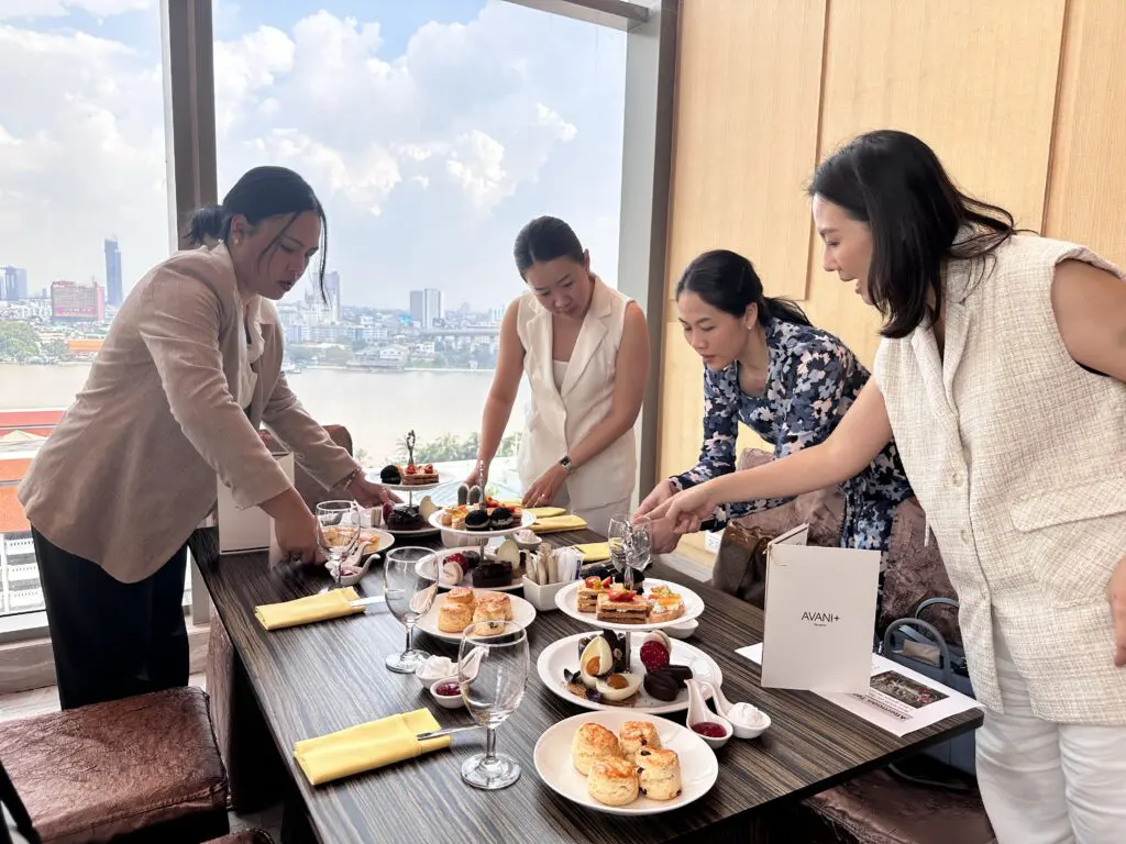 Hospitality professionals participating in hands-on service training hosted at a fine-dining venue, showcasing AIHM’s flexible executive education delivered on-site or at AIHM’s Bangkok campus.