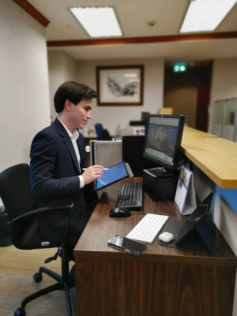 A hospitality management intern at AIHM gains hands-on experience in a professional office environment, working with digital tools, customer platforms, and real-world administrative operations.