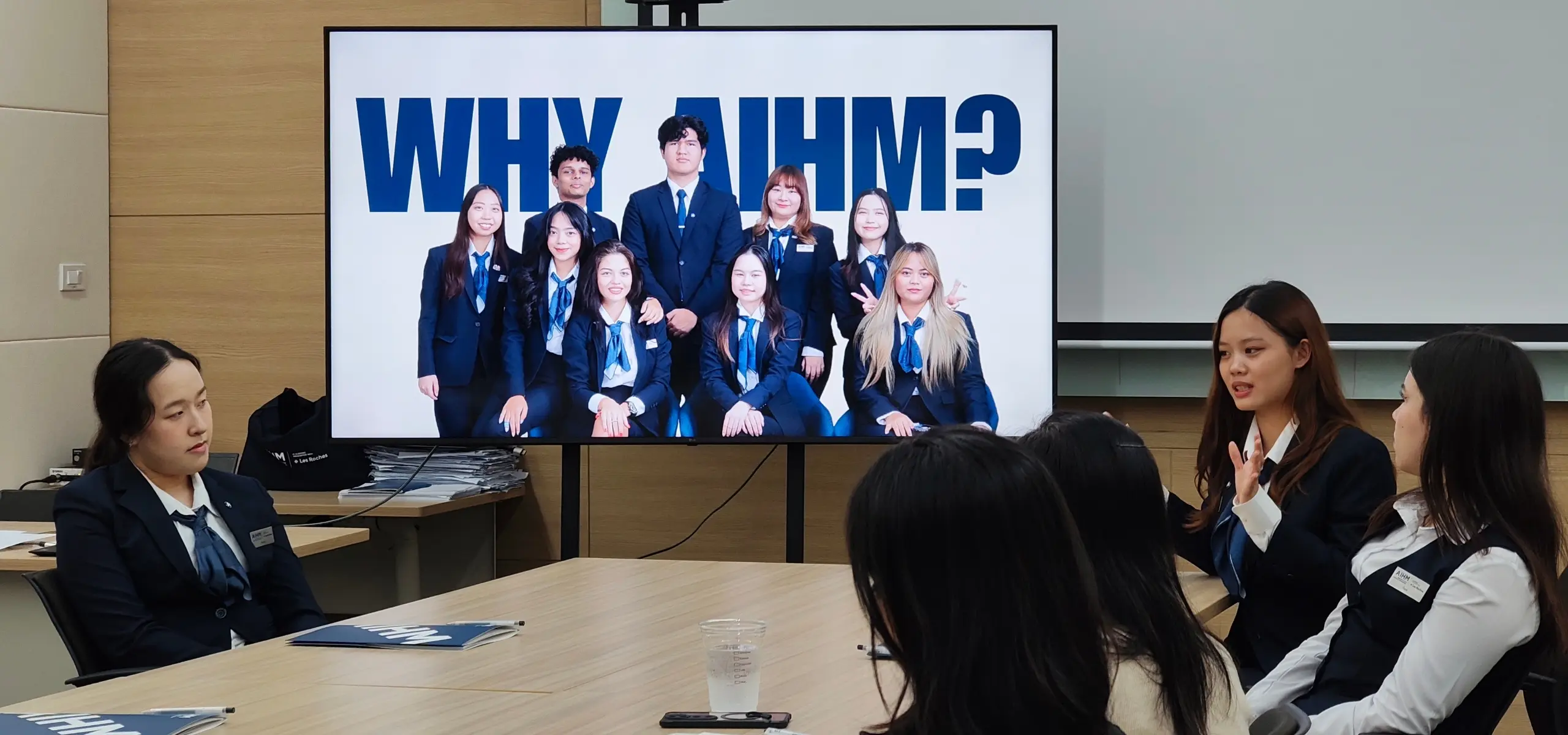 AIHM BBA hospitality management students engage in a leadership and communication session, showcasing international student life and dynamic learning in academic association with Les Roches.