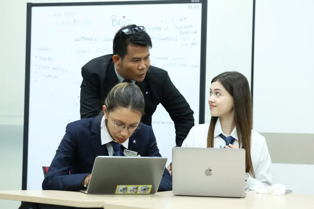 AIHM Student Ambassadors in professional uniforms at the Bangkok campus, representing hospitality leadership, student life, global education and Les Roches–aligned learning in Thailand.