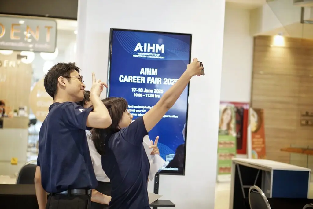 AIHM hospitality management students and ambassadors capture moments at the AIHM Career Fair, highlighting student life, career opportunities and industry connections in Thailand.