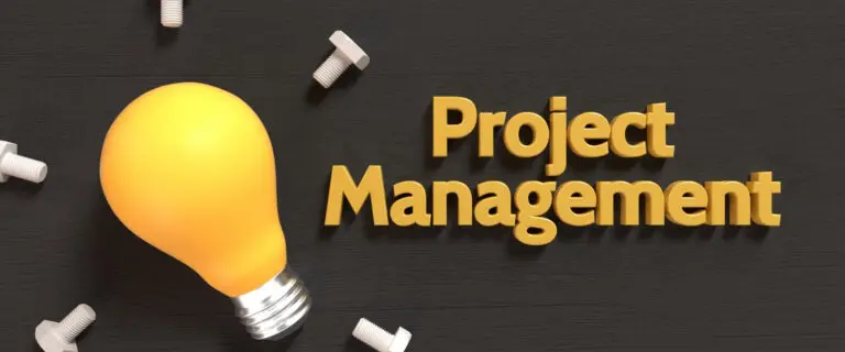 Project management concept with glowing light bulb and tools, representing planning, strategy, leadership skills and business management in modern organisations