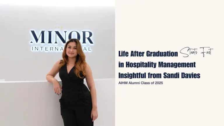Young hospitality management graduate Sandi Davies standing confidently at the Minor International office, sharing insights into life after graduation and her hotel management traineeship journey through AIHM