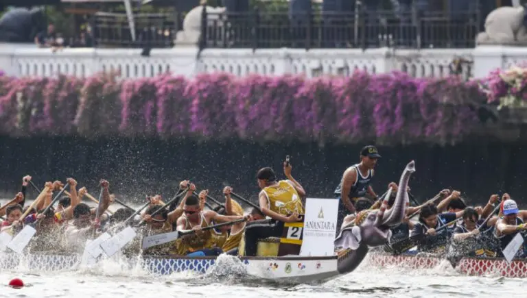 Teams competing in the Anantara elephant boat race on the Chao Phraya River during the Bangkok Riverside Fest, a Thai hospitality event