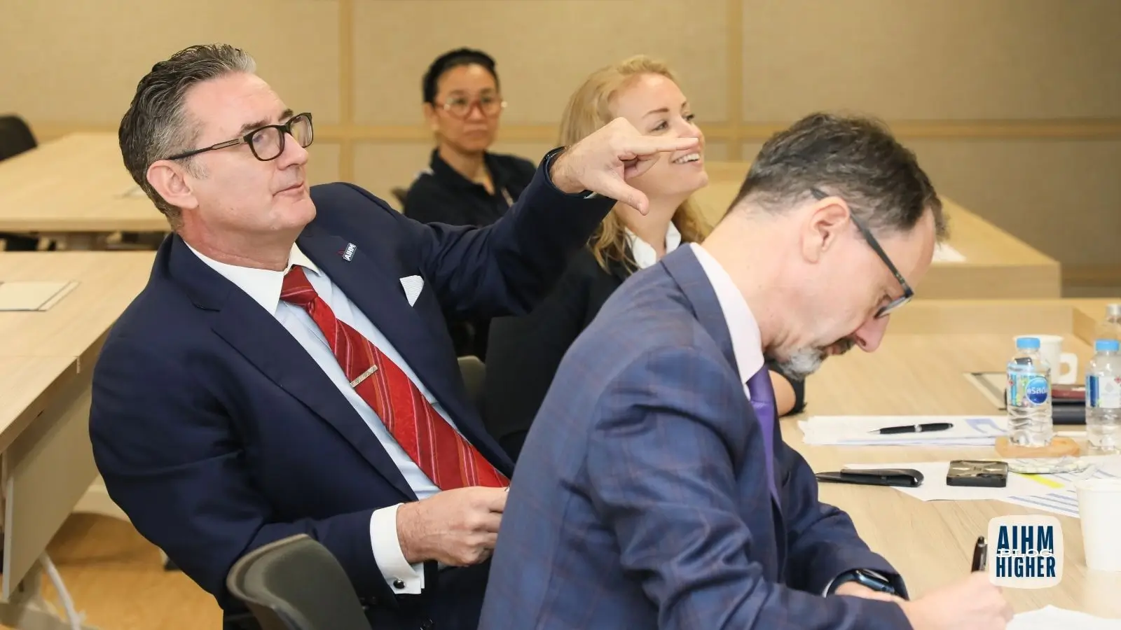 Warren Stanworth mentoring AIHM hospitality students during an interactive classroom discussion at the Asian Institute of Hospitality Management.