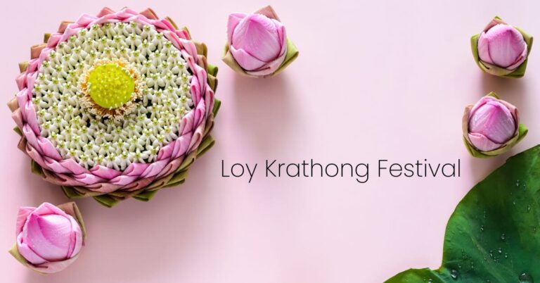 A beautifully decorated floral Krathong, adorned with pink lotus petals and a yellow center, lies on a pale pink background. Five lotus buds and green leaves surround it. The text “Loy Krathong Festival” is on the right.