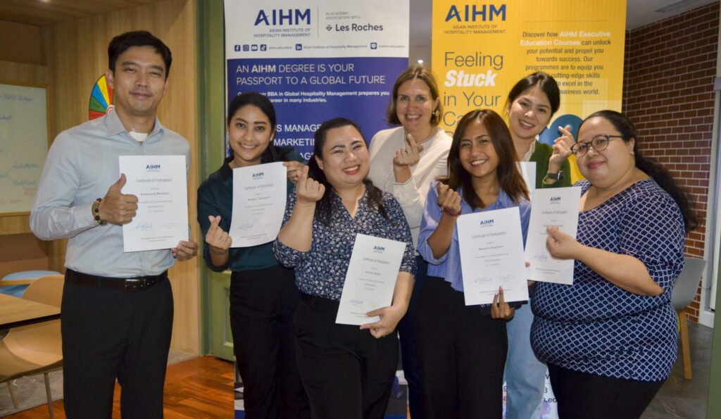 AIHM Executive Education Revenue Management course graduates in Pattaya celebrating completion of the short course, developing hotel revenue strategies, pricing skills, and data-driven decision-making.