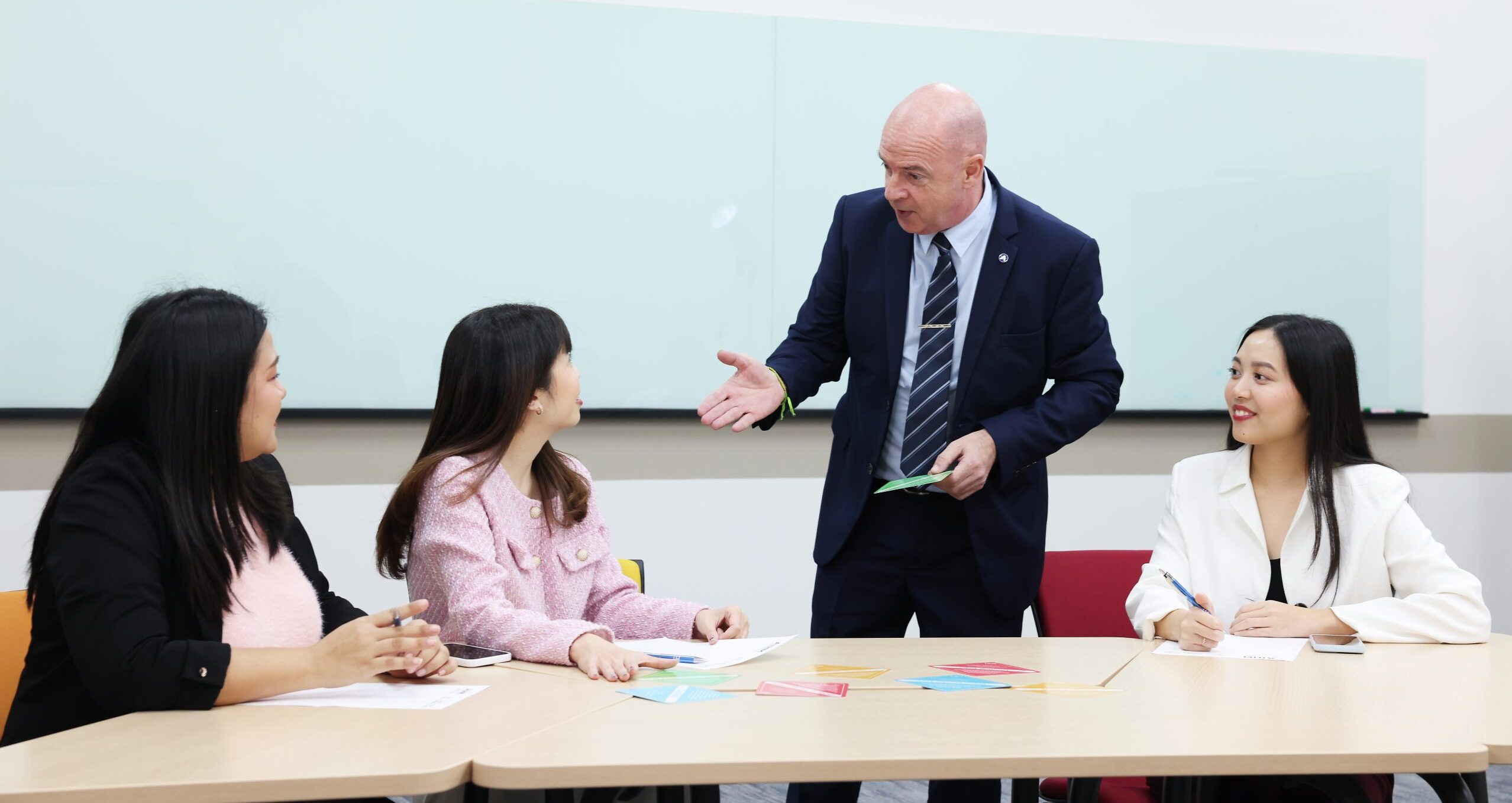 Executive training session at AIHM where a facilitator guides professionals through a customised workshop designed around your goals, team needs, and real hospitality challenges.