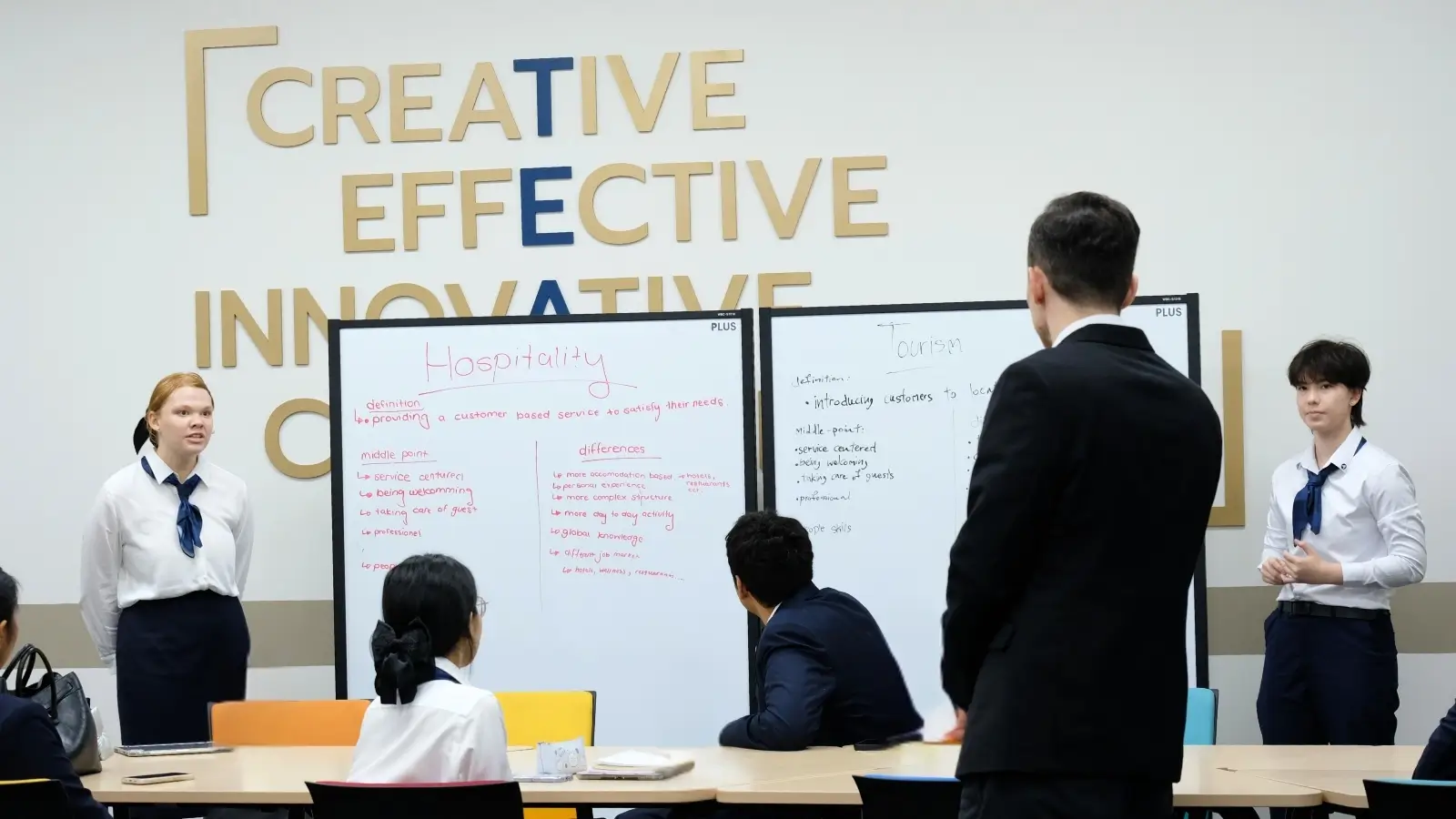 AIHM BBA hospitality management students learning in class with lecturers in Bangkok, developing real-world business and hospitality skills