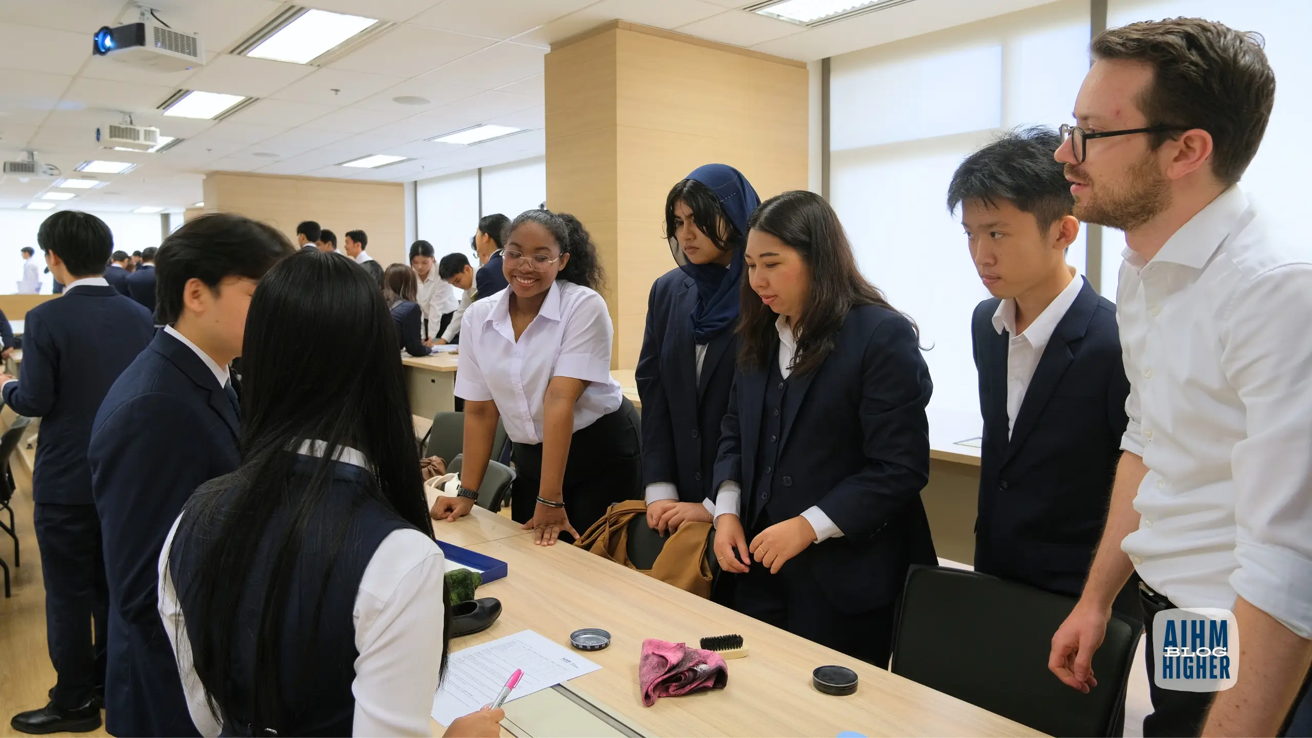 Hospitality students learning practical skills in classroom training session at AIHM during their first days
