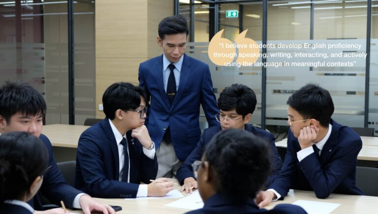 (EBAS lecturer quote header) AIHM EBAS lecturer Maytee Pakdiponpong on developing English proficiency through speaking, writing, and interaction, leading a hospitality student group discussion.