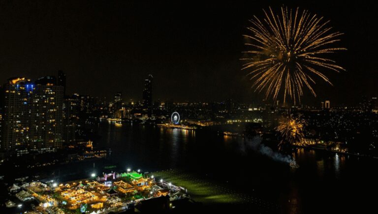 Fireworks over the Chao Phraya River and the illuminated Bangkok Riverside Fest grounds, where AIHM students gained hospitality event experience