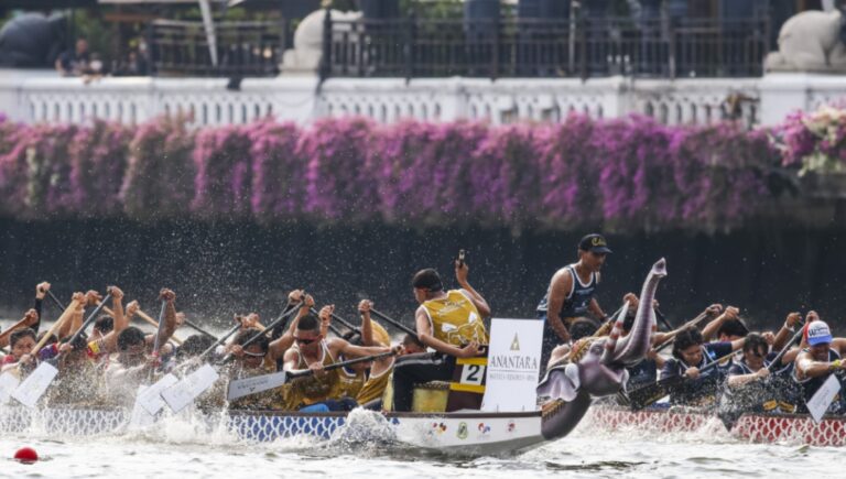 Teams competing in the Anantara elephant boat race on the Chao Phraya River during the Bangkok Riverside Fest, a Thai hospitality event