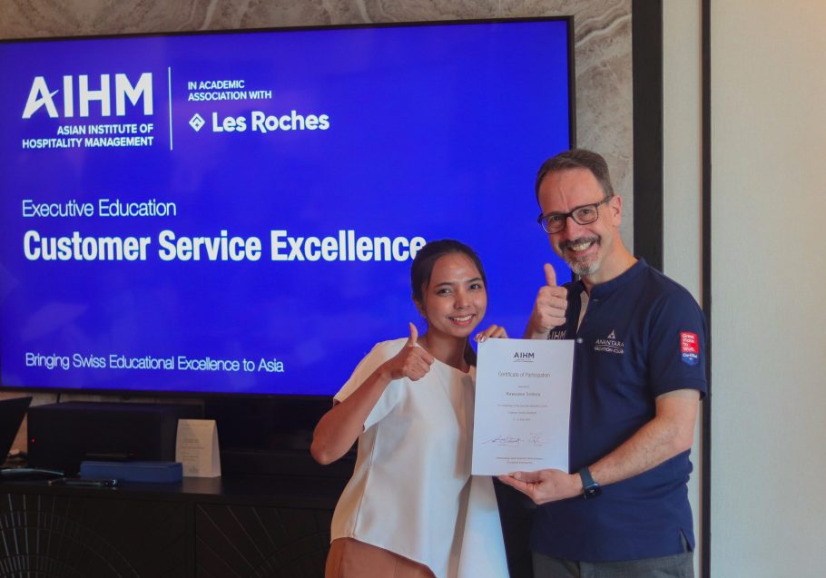 “AIHM Customer Service Excellence training—participant receiving certification after completing a professional development course focused on service skills, communication, and hospitality standards.